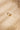 Highly textured gold band with an organic, hand-shaped surface. Captured from a front angle to highlight the warm tone of the gold and the depth of the rugged texture.
